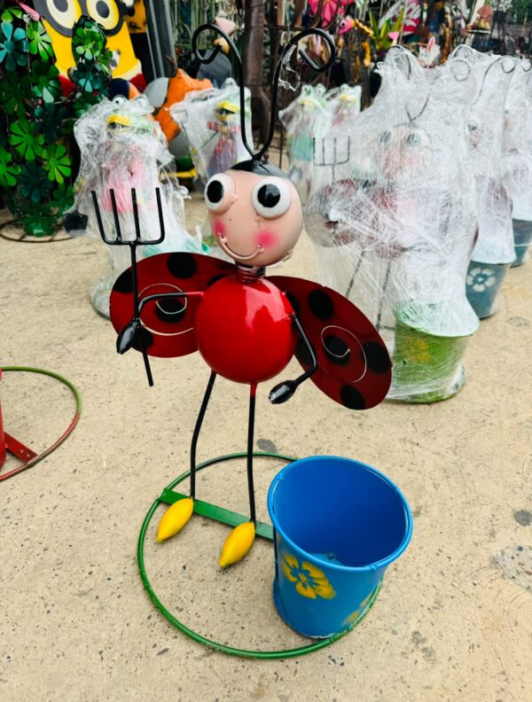 Ladybug with rake & bucket