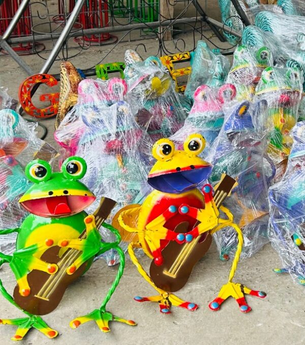 FROG WITH TRUMPET INSTRUMENT